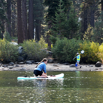 Keep Tahoe Blue citizen scientist volunteers and staff survey Donner Lake for aquatic invasive species.