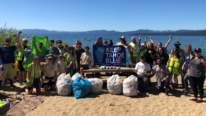 volunteers celebrate after a Labor Day cleanup